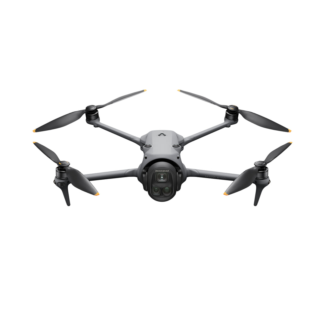 Black DJI Mavic 4 Pro drone with four propellers on a white background