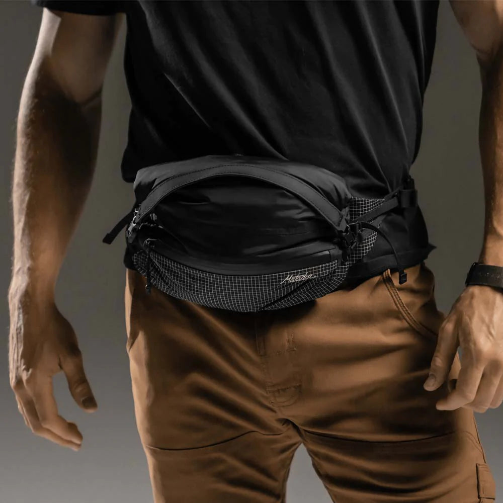 Man wearing hip pack at waist
