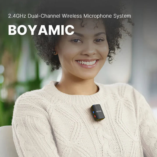 Woman wearing a wireless microphone system with 'BOYAMIC' branding