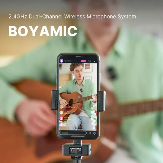 Phone with Boyamic microphone system displaying a person playing guitar, with '2.4GHz Dual-Channel Wireless Microphone System' text above.