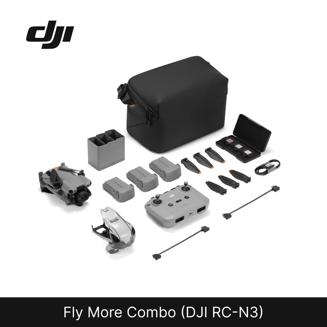 DJI Fly More Combo (DJI RC-N3) with various drone parts on a white background