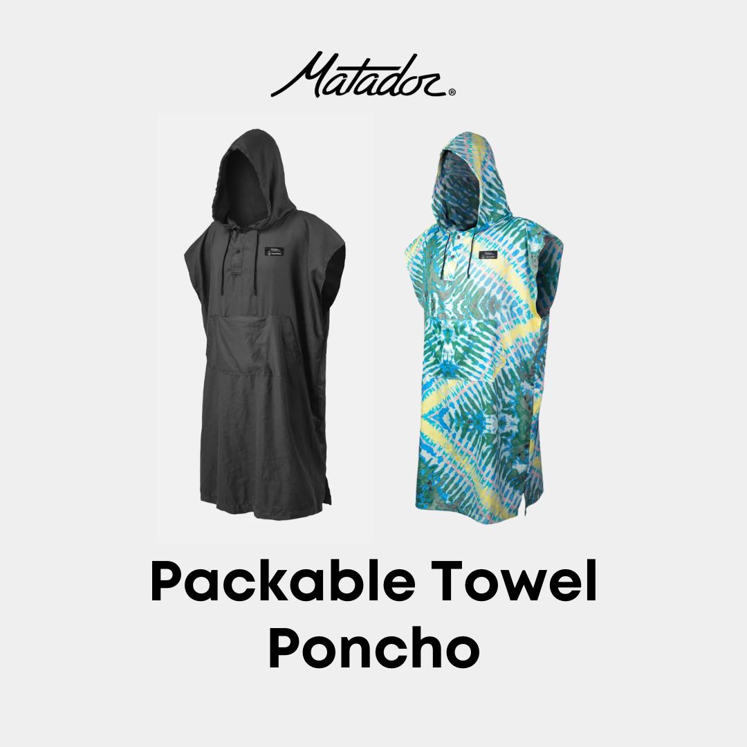 An image featuring two Matador Packable Towel Ponchos against a light gray background. The left poncho is solid black with a hood and a small logo, while the right poncho is colorful with a green, blue, and yellow tie-dye pattern and a hood. The text "Packable Towel Poncho" is displayed below the ponchos, with the Matador logo at the top.