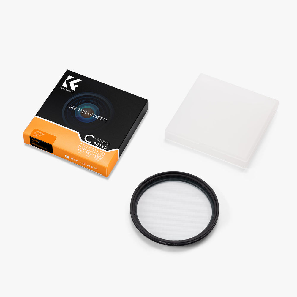 Camera lens filter with packaging and cleaning cloth on a white background