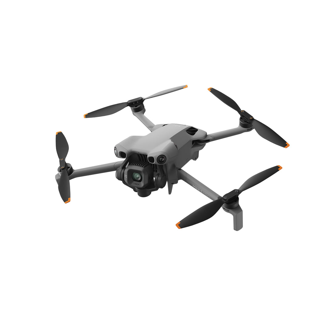 DJI Mini 5 Pro drone with four propellers on a white background