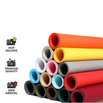 A collection of seamless background papers in various colors including hot selling colors and premium quality, arranged in a fanned-out stack showcasing the available color options.