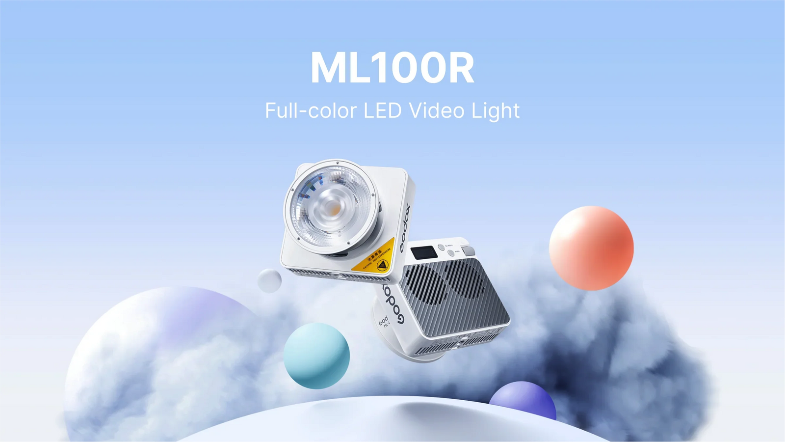 Godox ML100R full-color LED video light floating with colorful spheres on a blue background