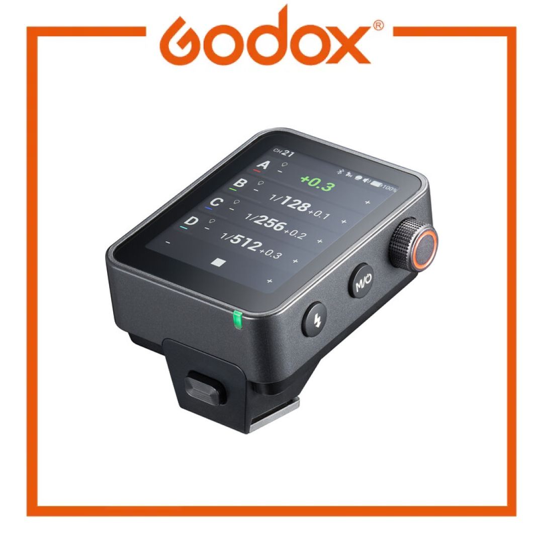 Godox camera remote control with display on a white background