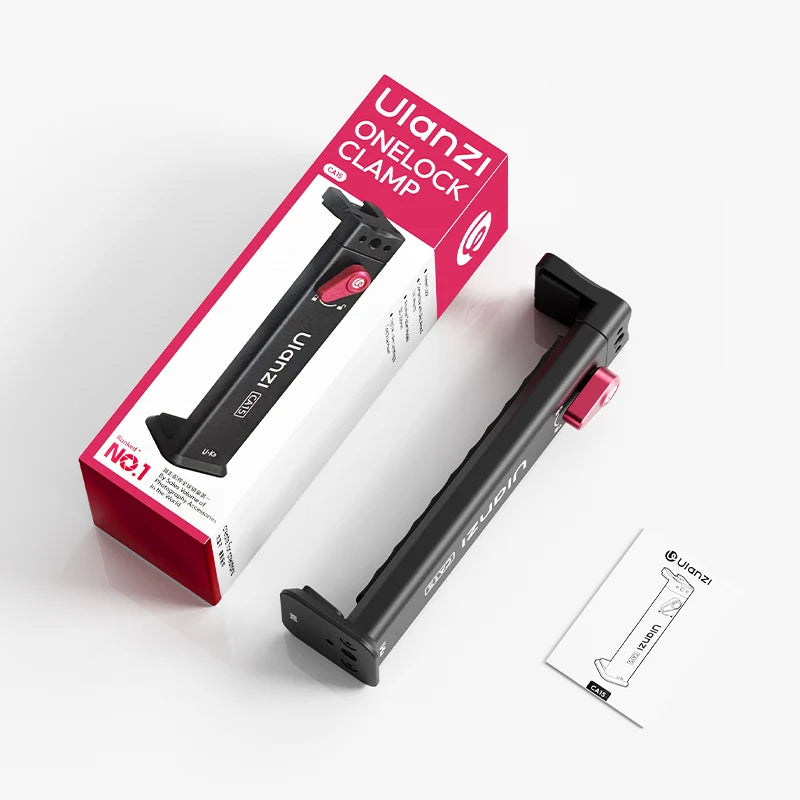A black Ulanzi one-block clamp with a pink release button shown next to its red and white retail box and a small instruction sheet on a light gray background.
