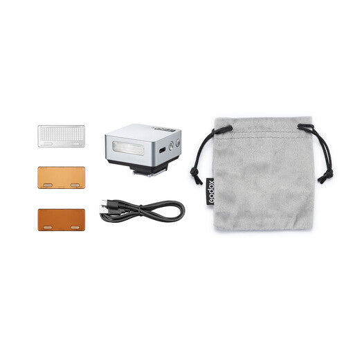 Godox iT20 Camera flash with accessories and a drawstring pouch on a white background