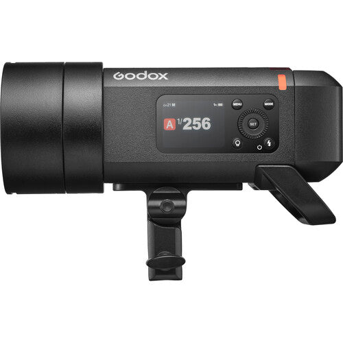 Godox studio light with digital display on a white background