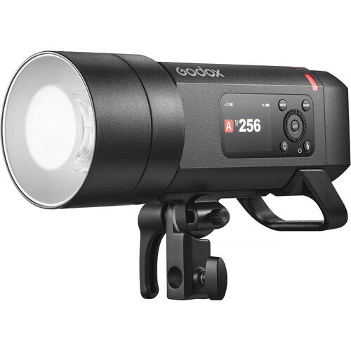 Godox studio light with digital display on a white background