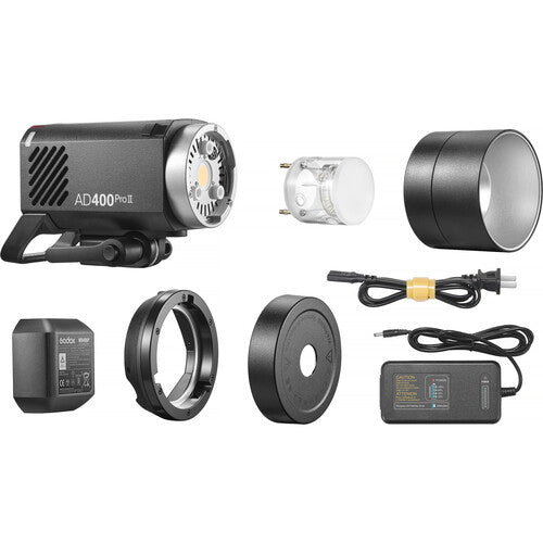 Camera light kit with various components on a white background