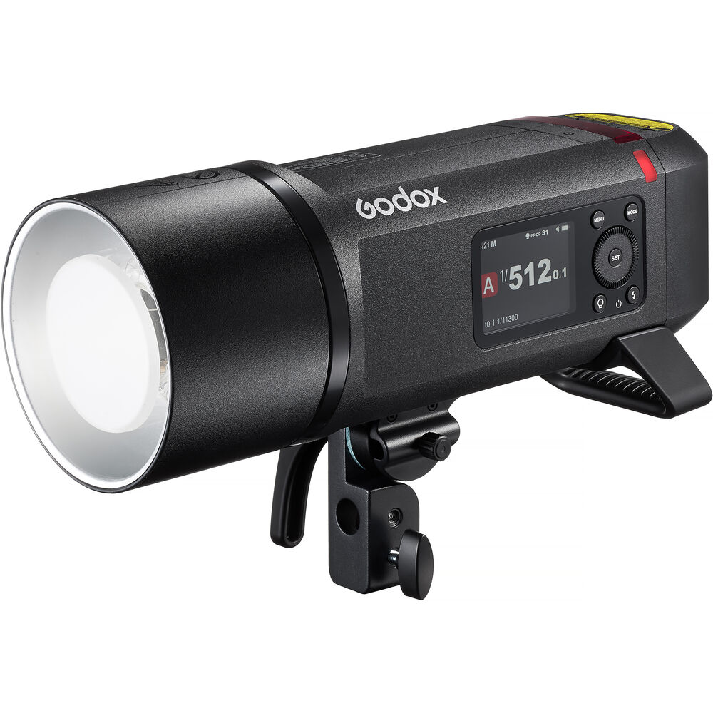 Godox studio light with digital display on a white background