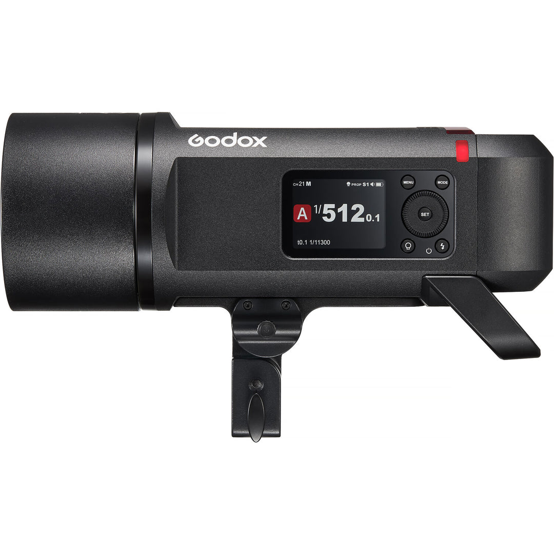 Godox studio light with digital display on a white background