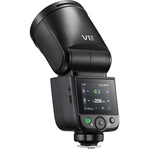 Godox V1 mid camera flash with digital display on a white background