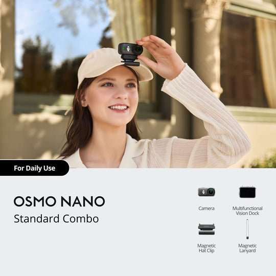 Woman wearing a cap with a camera attached, outdoors.