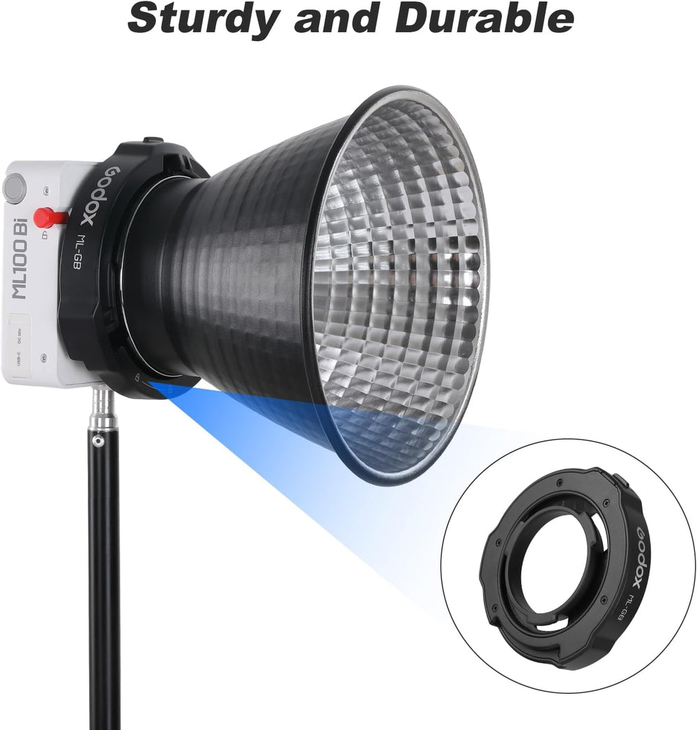 Studio light with detachable lens on a white background, featuring the brand 'GODOX'.