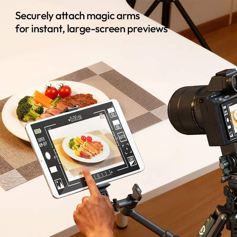 Camera setup with tablet displaying food images on a table