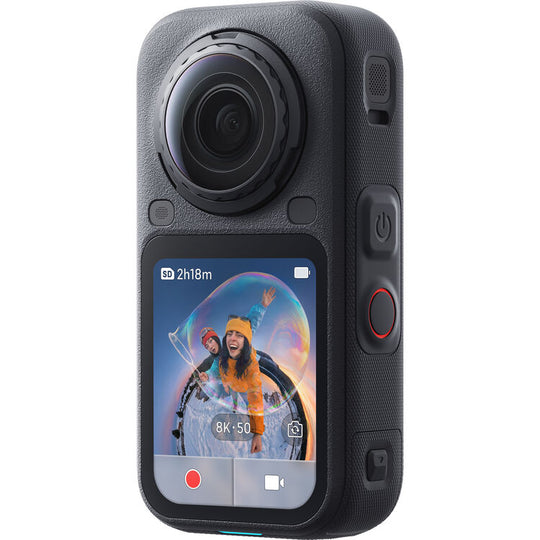 A black Insta360 X6 action camera with a textured grip, a large front lens, and a color screen showing a photo of two people in bubbles. The camera has physical buttons on the right side, including a red record button, and is photographed on a clean white background.