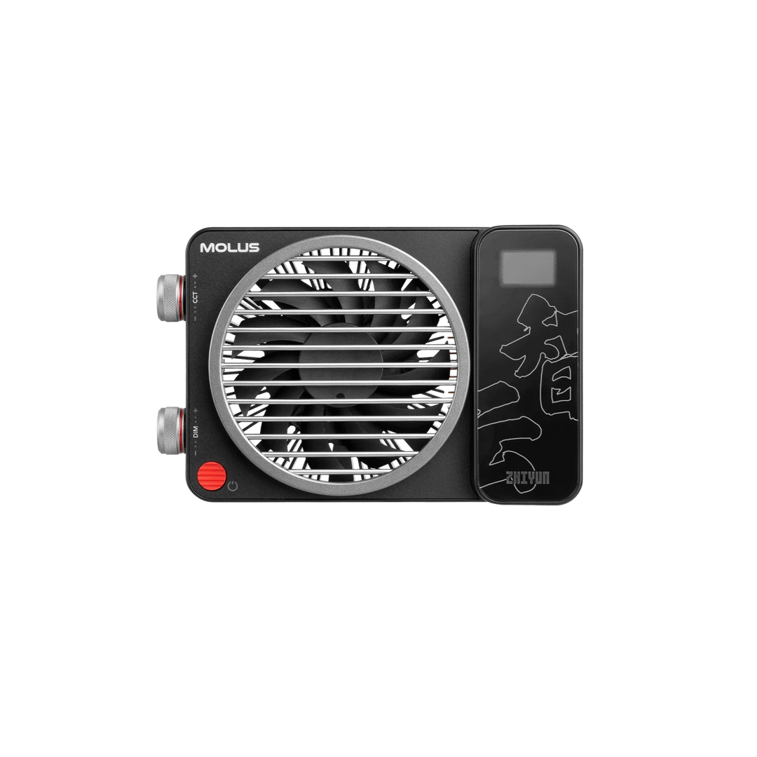 A black ZHIYUN MOLUS X100 LED Light with a circular fan grille, silver control knobs, a red power button, and a digital display screen on the side, shown against a plain white background.