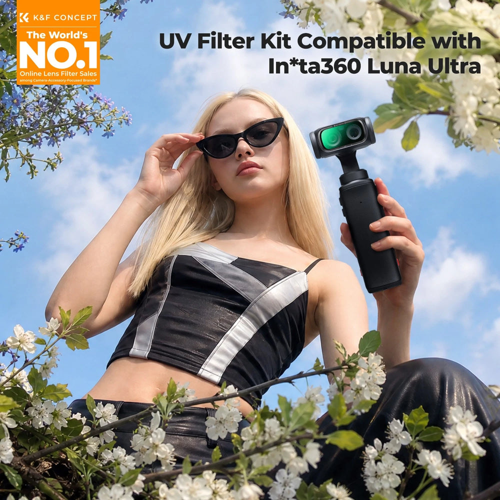 A woman outdoors wearing black sunglasses and holding a black handheld camera accessory with a green UV filter attachment. The scene includes blooming white flowers, blue sky, and promotional text reading 'UV Filter Kit Compatible with Insta360 Luna Ultra' plus an orange 'K&F Concept The World's No.