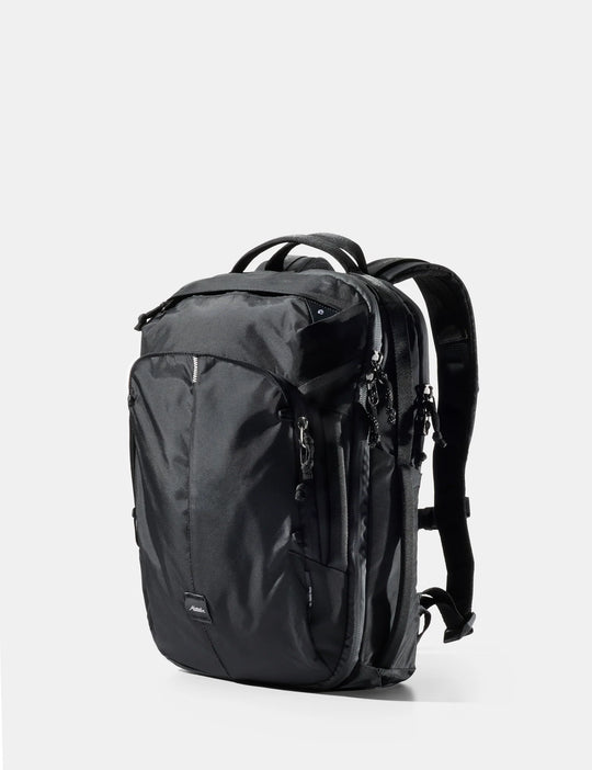 Black backpack on a white background