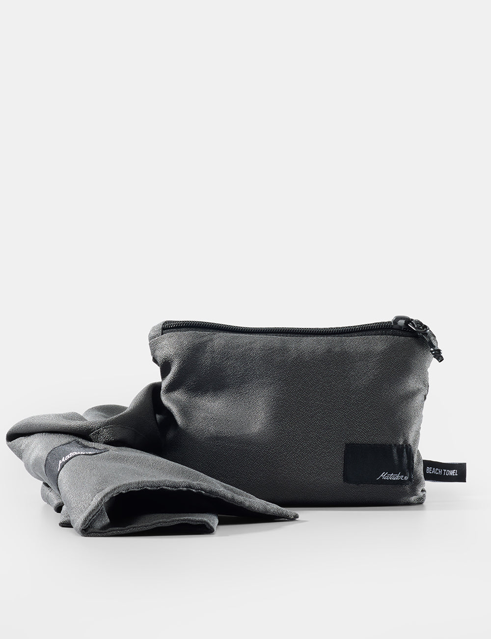 Black pouch with a folded gray fabric on a white background