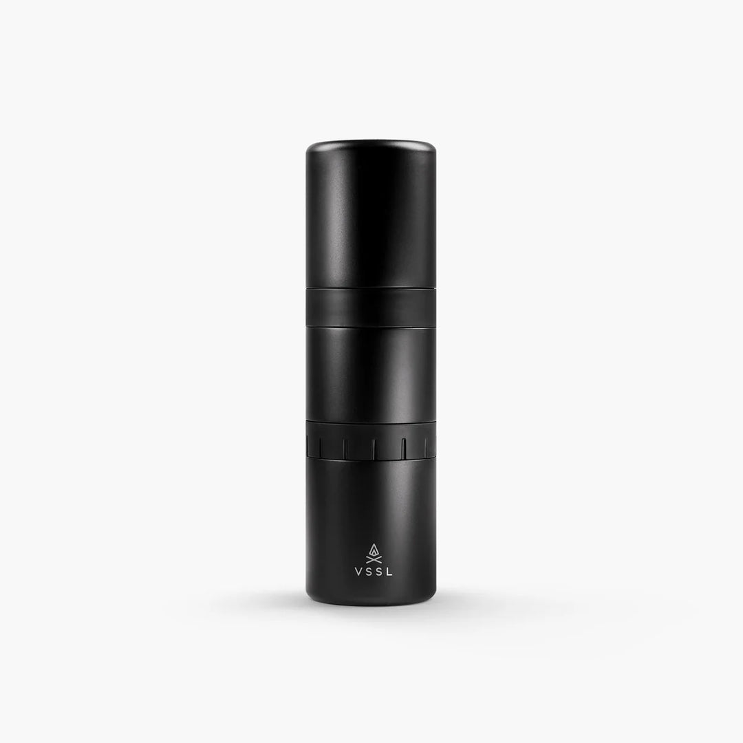 Black travel mug with VSSL logo on a white background