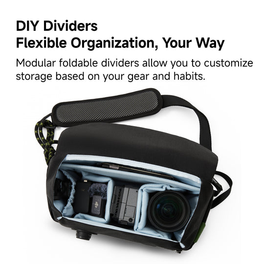 Black bag with modular foldable dividers for flexible organization on a white background