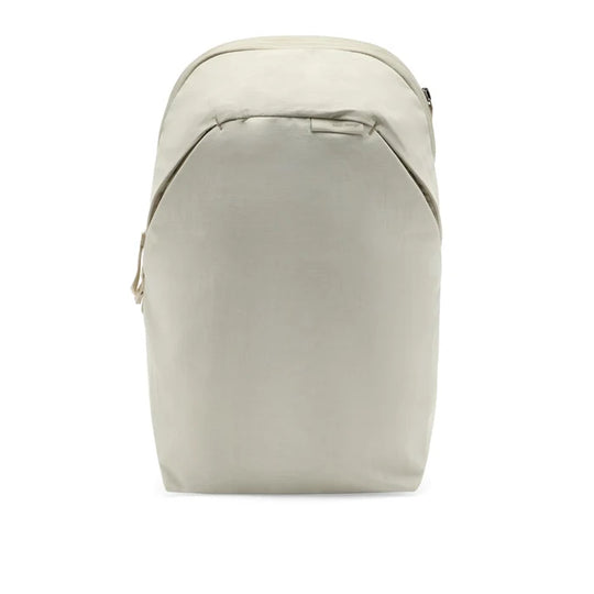 A minimalist, structured backpack in a light beige or off-white color, shown from the front against a solid white background.