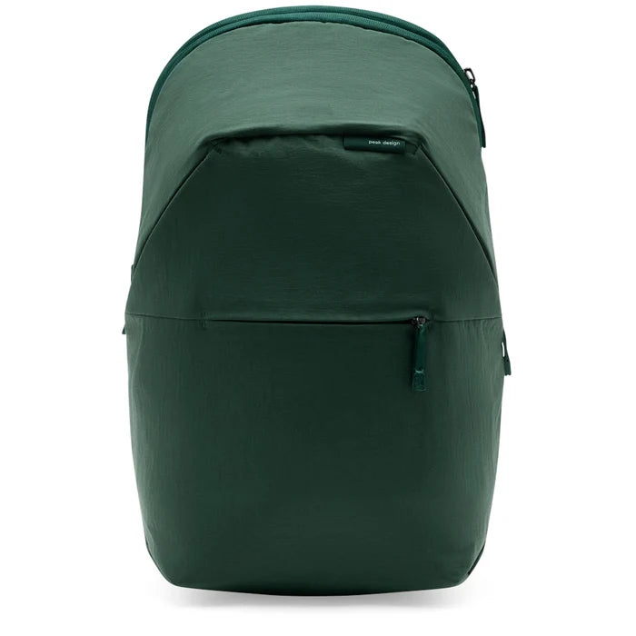 A dark green backpack with a front zippered pocket, shown from the front against a plain white background.