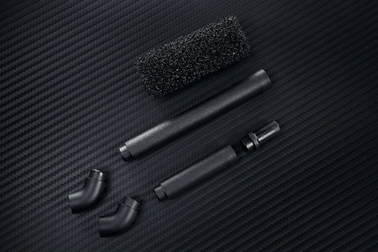 PMI SmokeNINJA PRO - Handheld Fog Machine accessories on a textured black surface