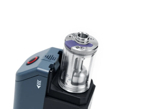 Handheld Fog Machine with a clear chamber on a white background