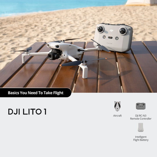 DJI LITO 1 drone and remote control on a wooden surface with beach background