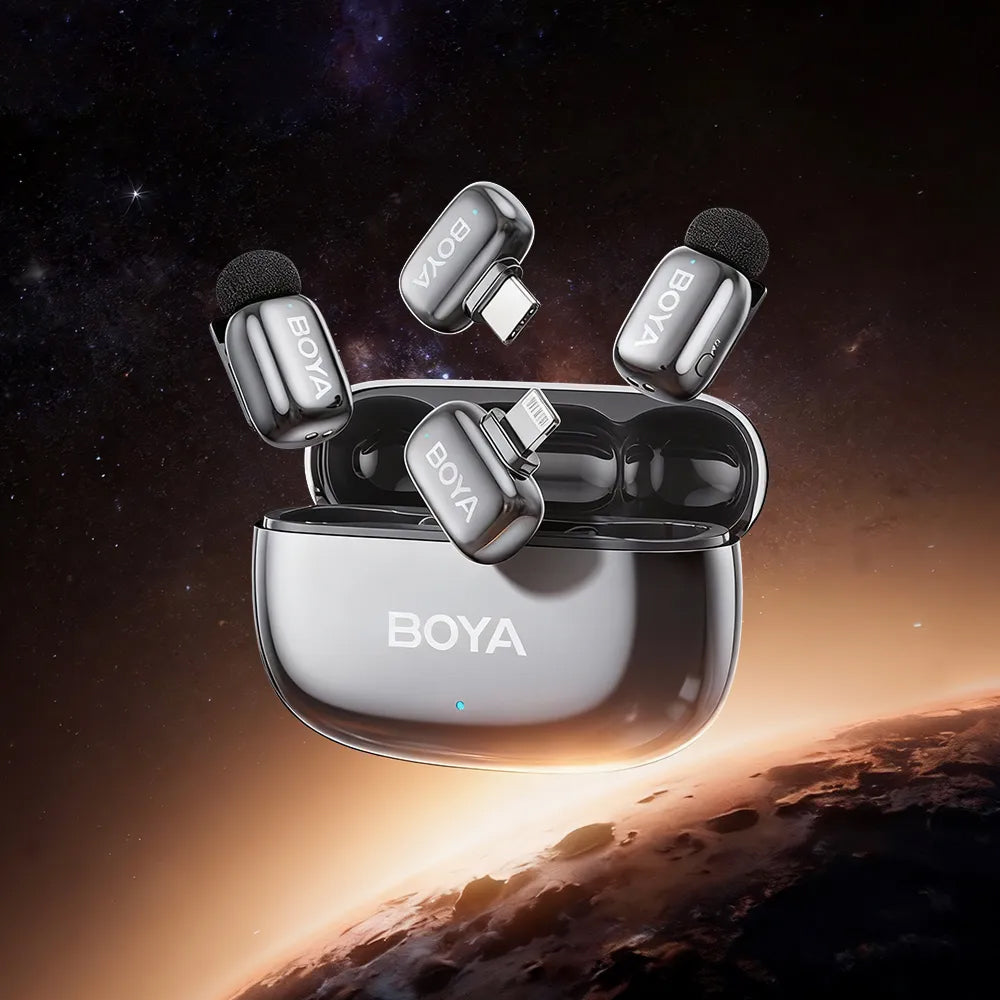 BOYA wireless microphone system with clear case against a space-themed background