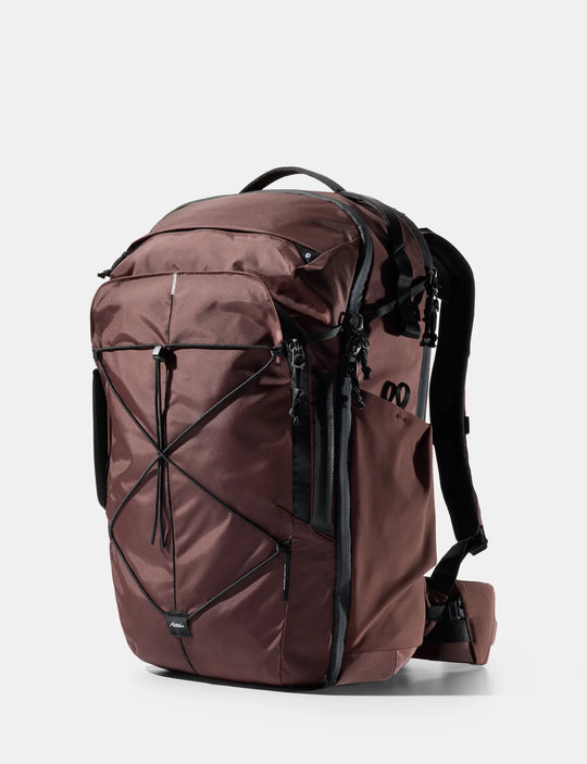 Brown backpack with black straps on a white background