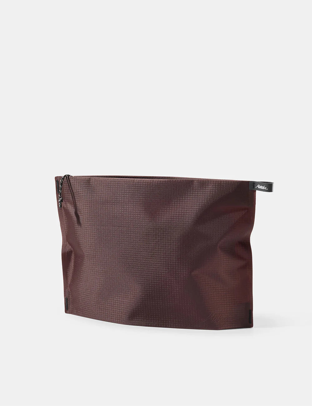 A dark brown waterproof pouch with a textured grid pattern, featuring a black zipper pull and a small black brand tab on the top right edge, set against a plain light gray background.