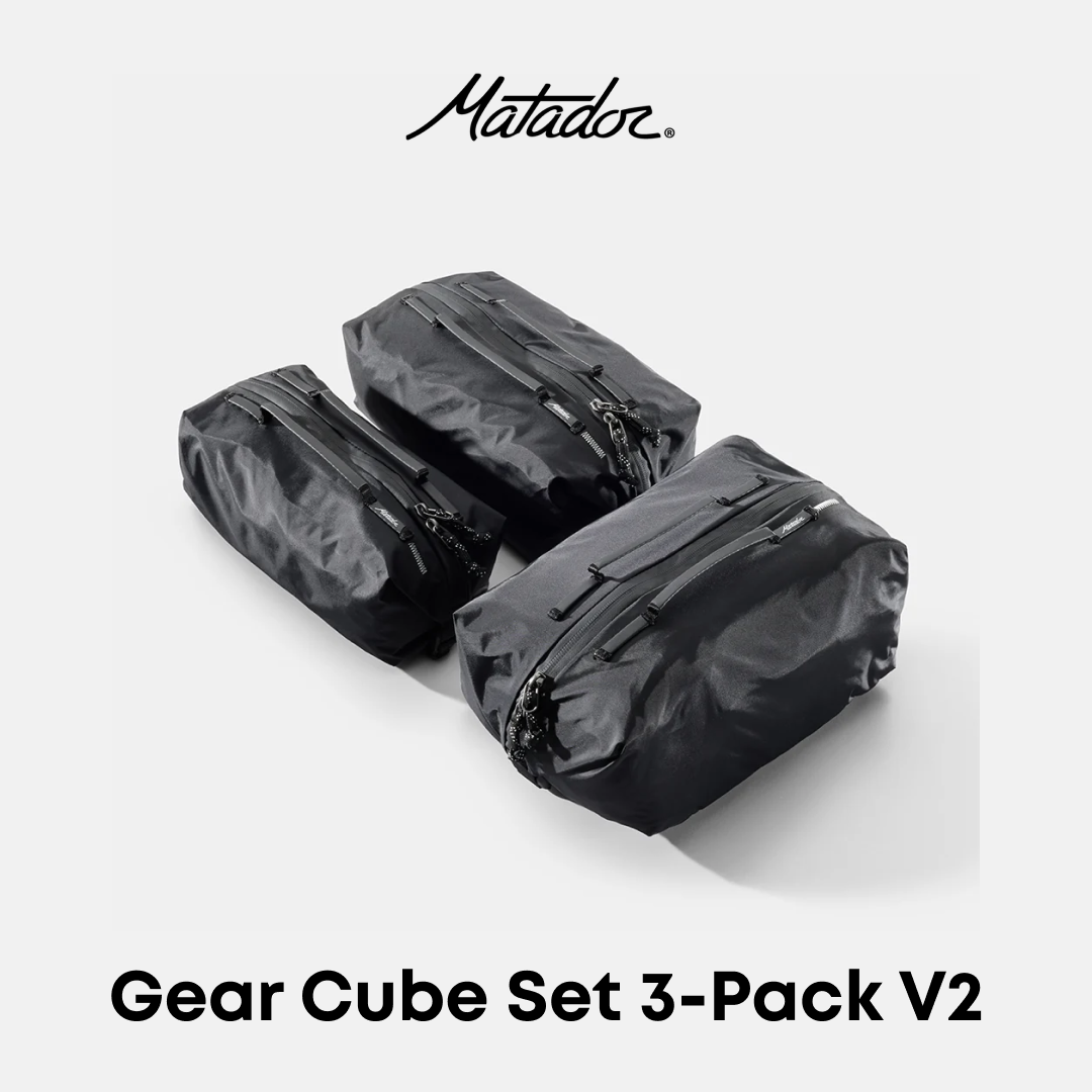 Three black waterproof gear cubes arranged in a set on a light gray background, with the Matador logo at the top and the text 'Gear Cube Set 3-Pack V2' at the bottom.