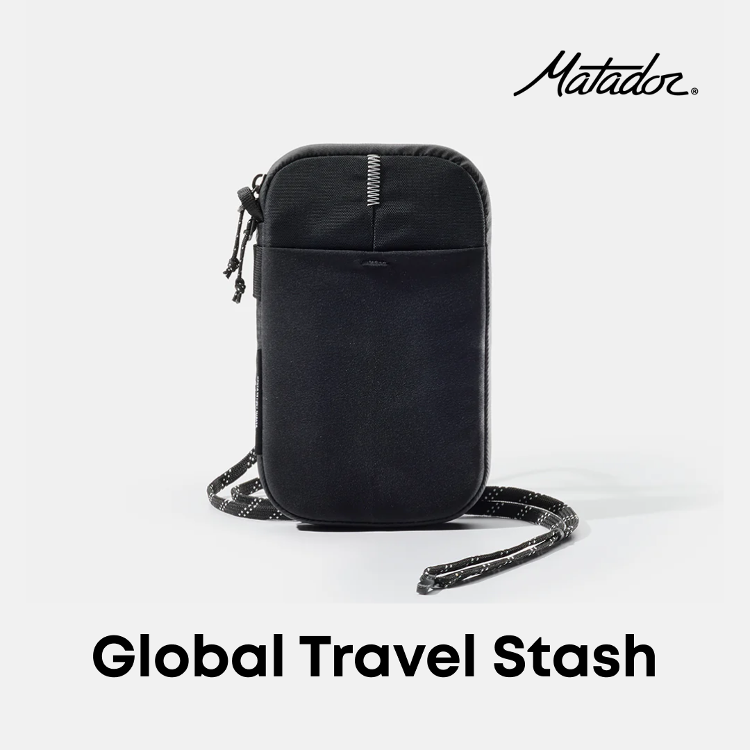 Black Global Travel Stash with crossbody strap on a white background, featuring the Matador brand.