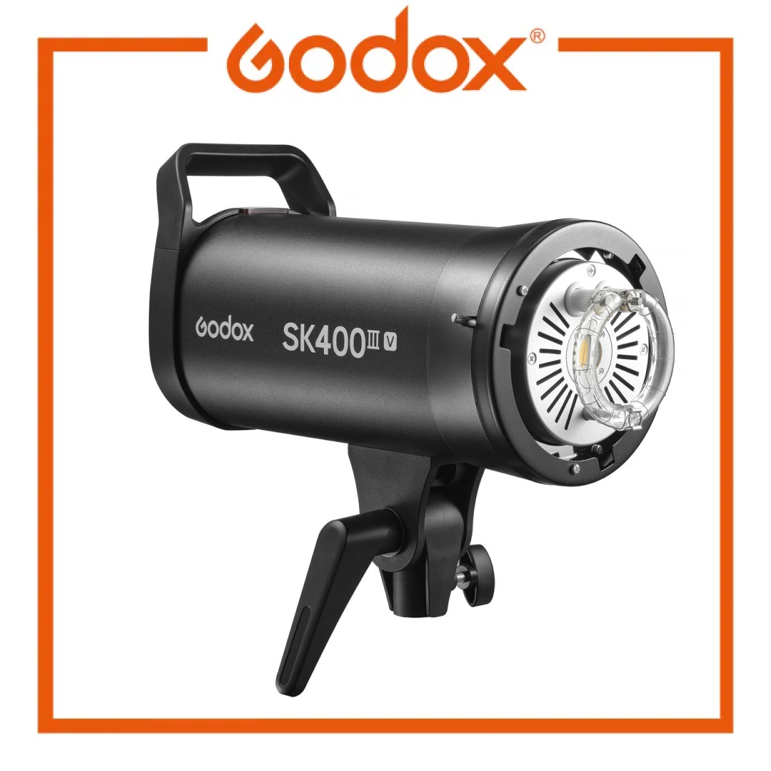 Godox SK400III-V studio flash strobe light featuring built-in 2.4G wireless system and LED modeling lamp.