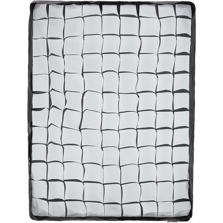 Grid-patterned mat with black and white squares on a white background