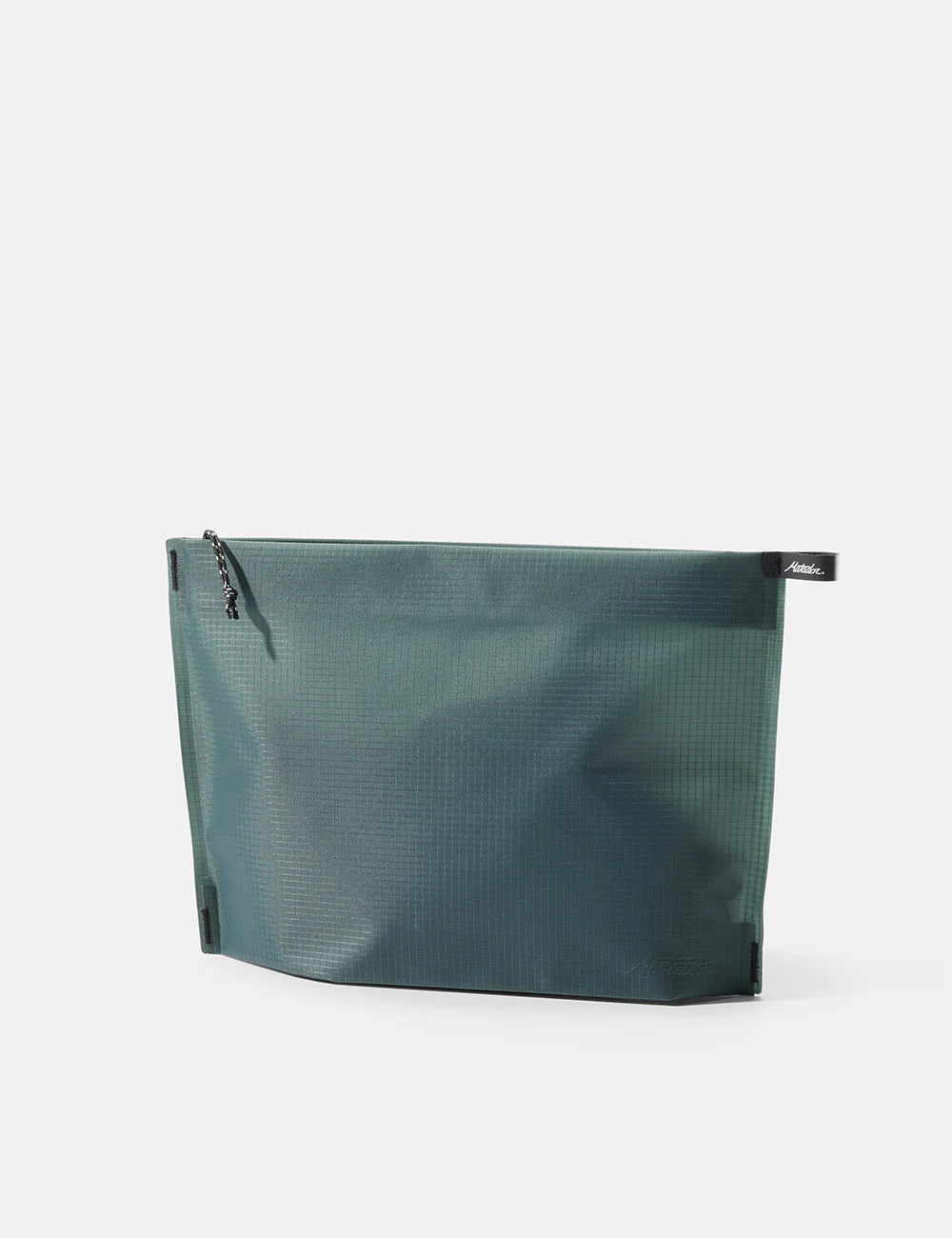 A dark teal waterproof zip pouch with a textured grid pattern, shown from a three-quarter angle on a light gray background. A small black brand tab for &