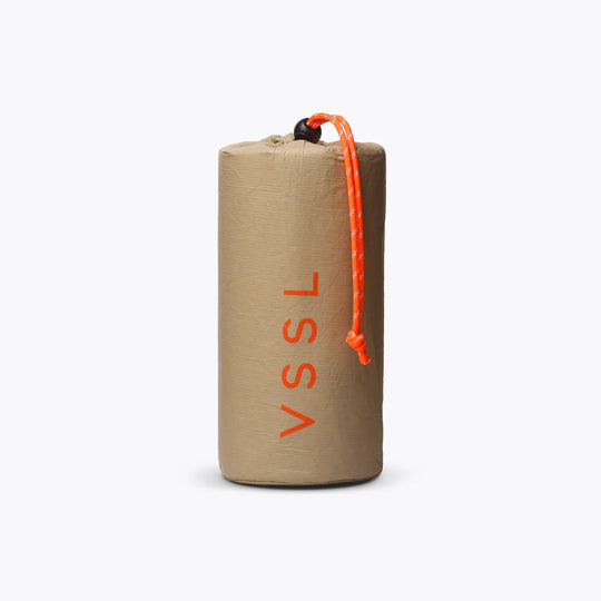 Kraft paper bag with orange drawstring and &