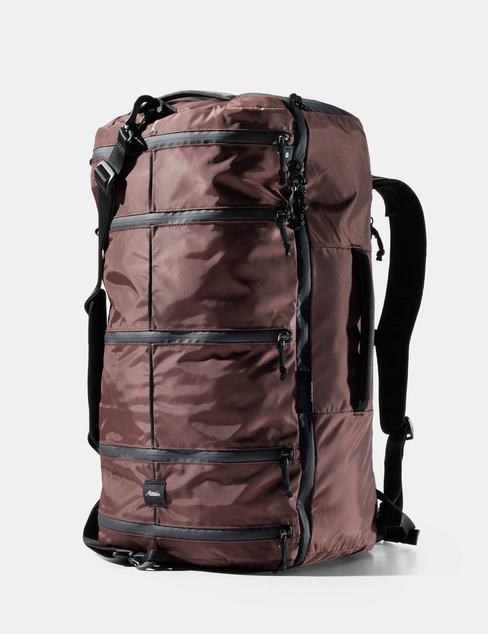 A brown waterproof backpack with multiple zippered compartments and black straps, shown on a light gray background.