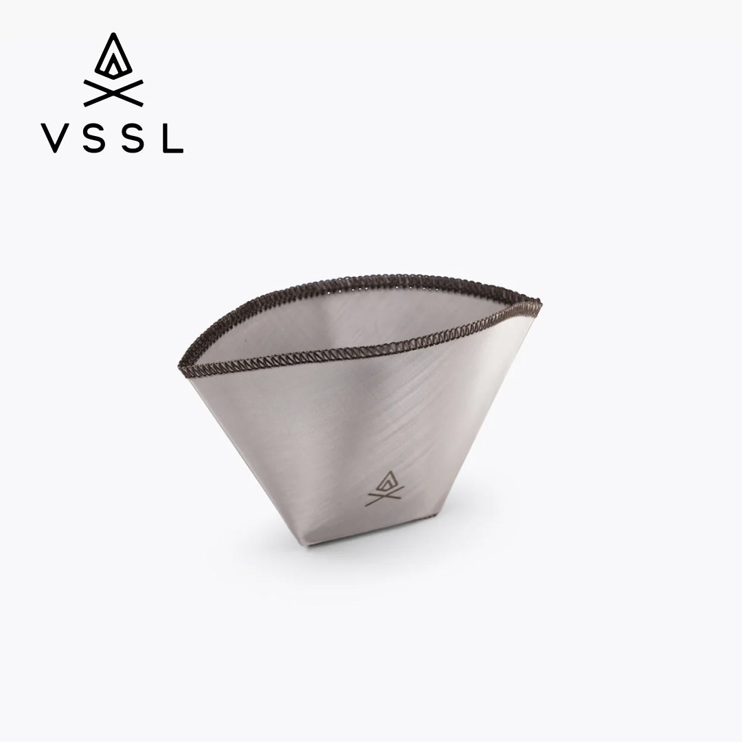 A VSSL stainless steel cone filter basket with a dark charcoal mesh rim, shown on a clean white background with the VSSL logo in the top-left corner.