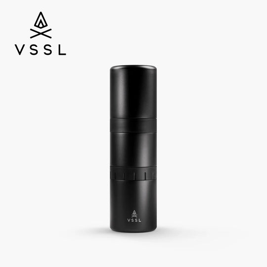 A black VSSL travel water filter straw container shown on a light gray background with the VSSL logo in the top left corner.