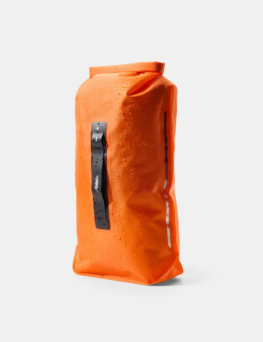 Orange Matador Matador FlatPak™ Dry Bag - 8L on a white background