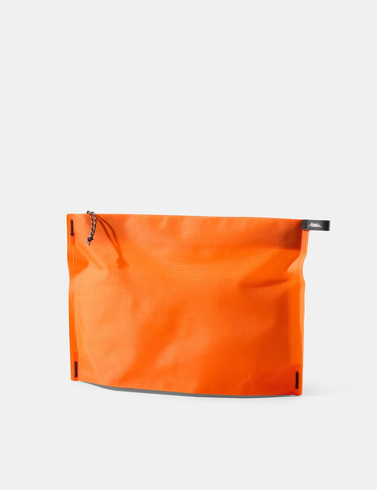 Orange pouch with a brand logo on a white background