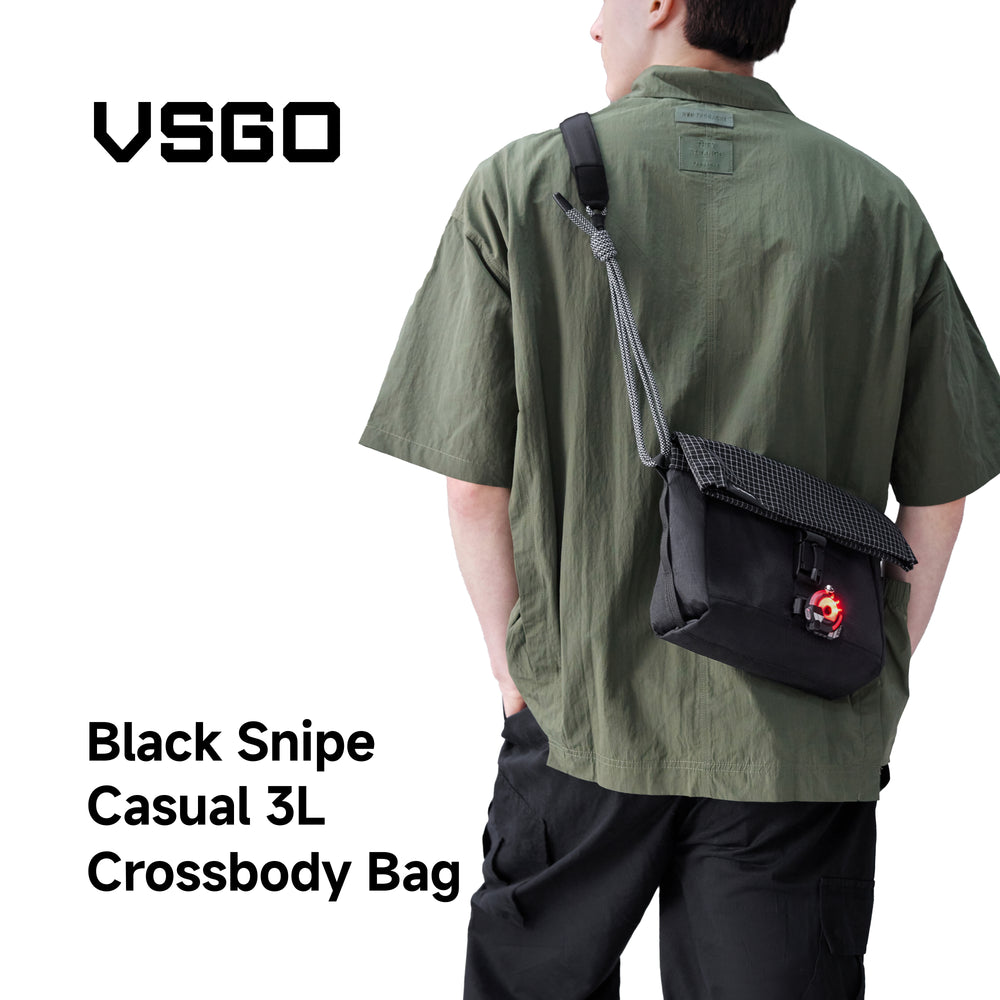 Person wearing a black crossbody bag with 'VSGO' branding on a white background