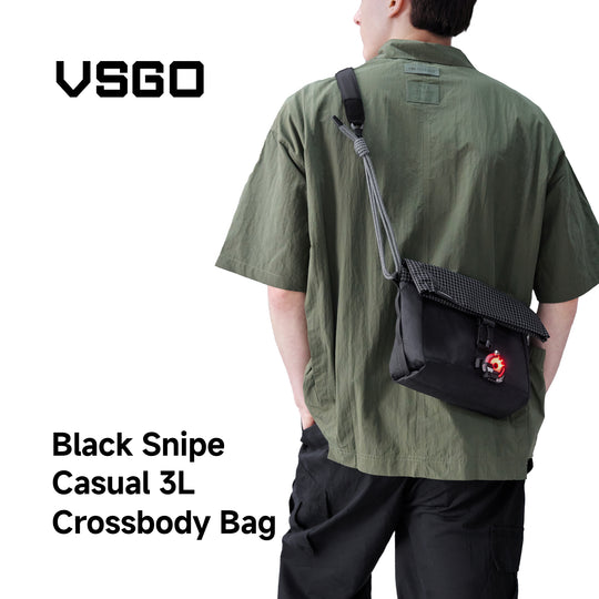 Person wearing a black crossbody bag with 'VSGO' branding on a white background